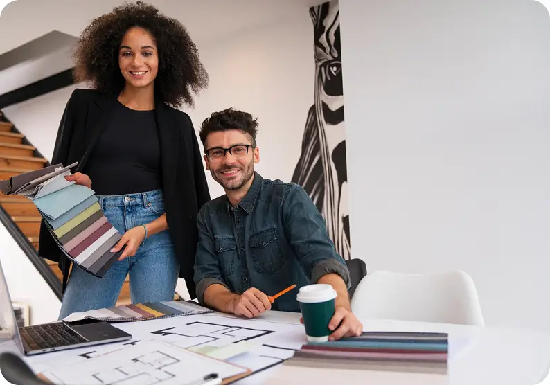 Two people choosing materials and colors on the desk